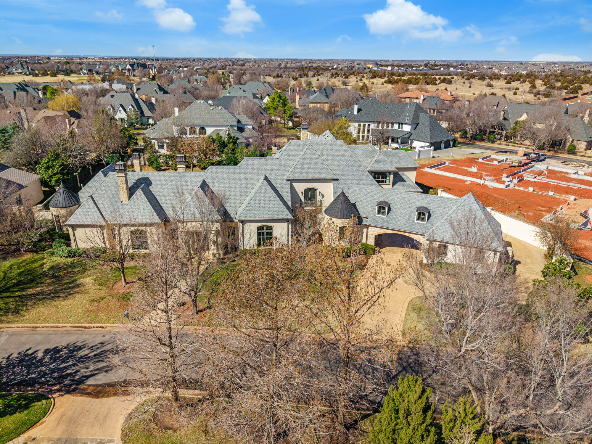 European estate in Oklahoma City — aerial drone view of the French Country property